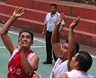 A closely contested Sunday morning basketball game in Parque Juarez